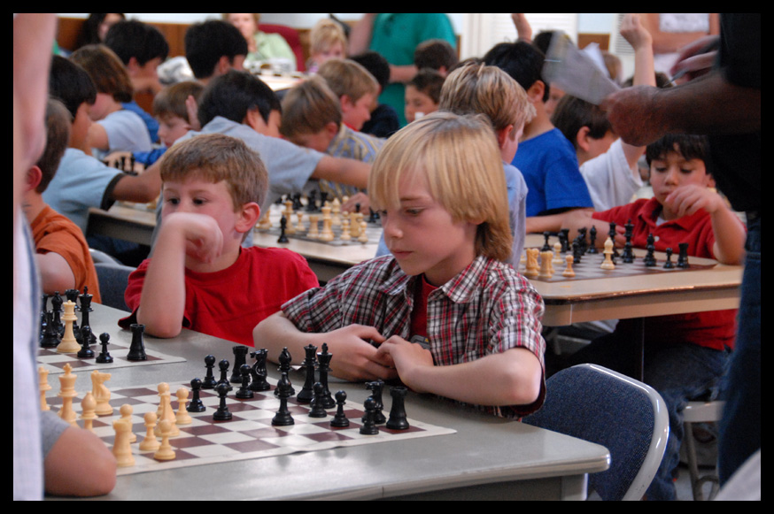 Kids at Chess Center playing with deep concentration